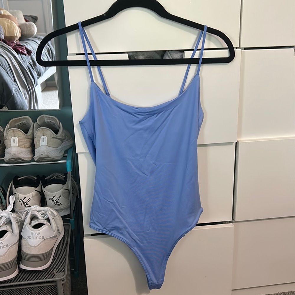 Ardene baby blue bodysuit, size SMALL